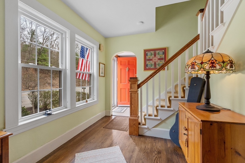 613 Petersham Road Athol, MA 01331 - Photo 16 of 41 a view of an entryway with wooden floor and windows