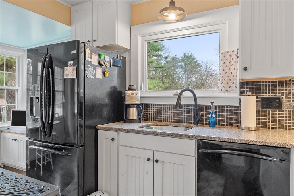 613 Petersham Road Athol, MA 01331 - Photo 23 of 41 a kitchen with stainless steel appliances granite countertop a refrigerator and a sink