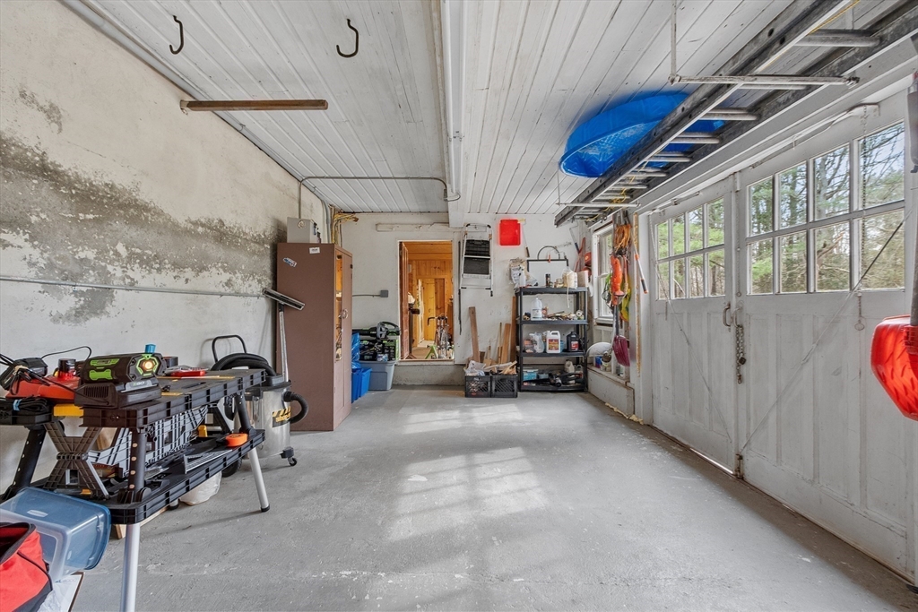 613 Petersham Road Athol, MA 01331 - Photo 35 of 41 a view of a garage with storage