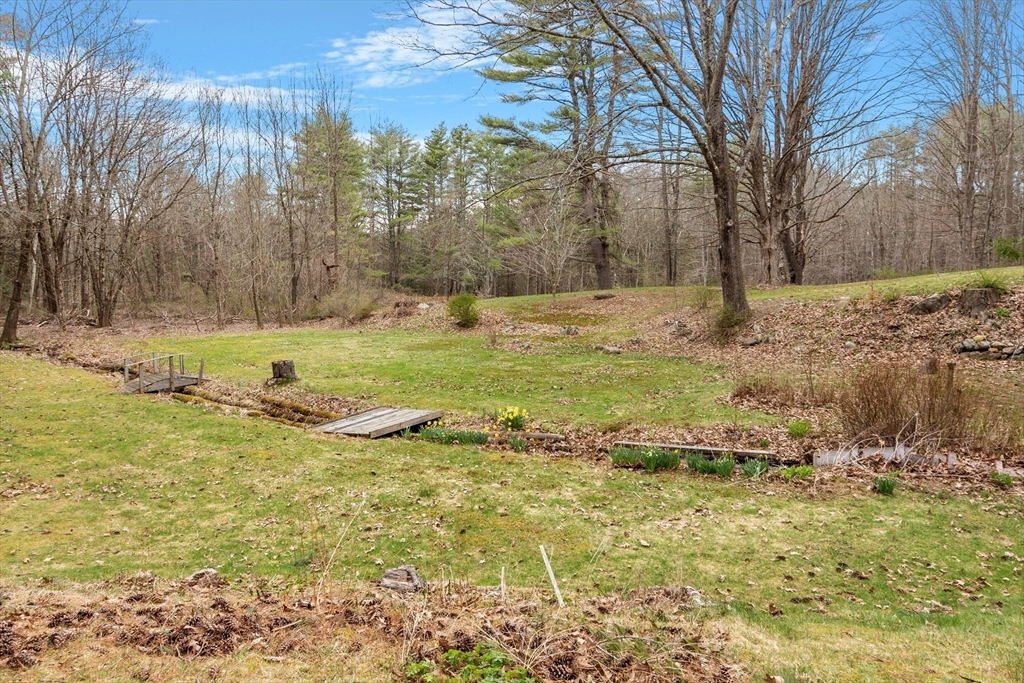 613 Petersham Road Athol, MA 01331 - Photo 9 of 41 a view of a yard with an trees