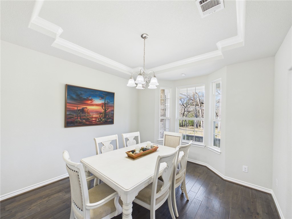 10645 C Hoppess Road Franklin, TX 77856 - Photo 14 of 50 a view of a dining room with furniture window and wooden floor