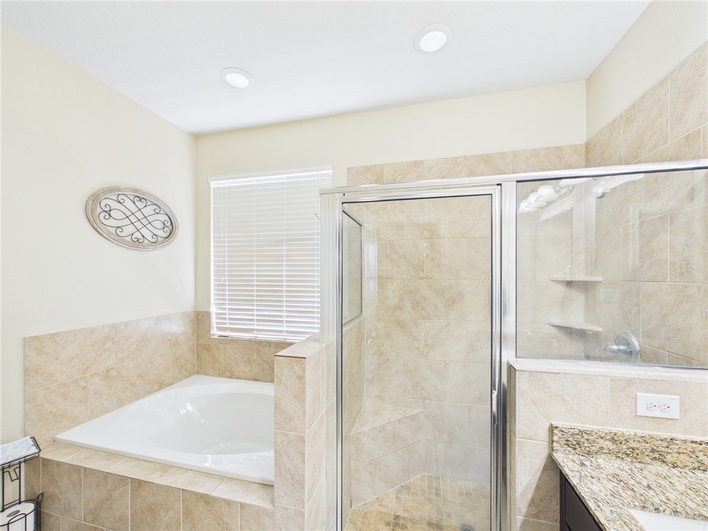 10645 C Hoppess Road Franklin, TX 77856 - Photo 24 of 50 a bathroom with a shower and a bathtub