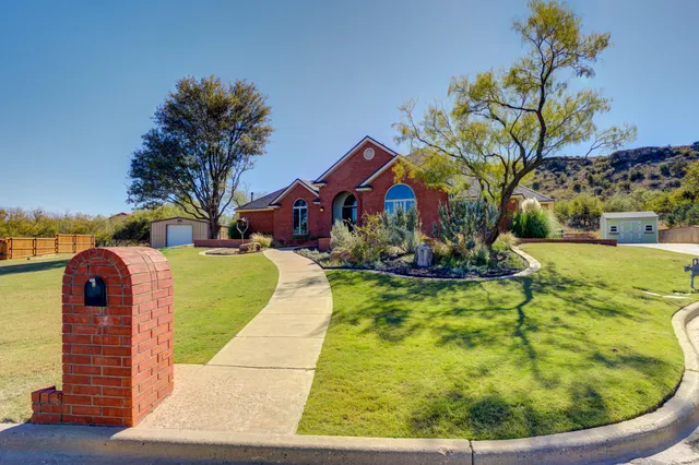 a view of a house with a big yard
