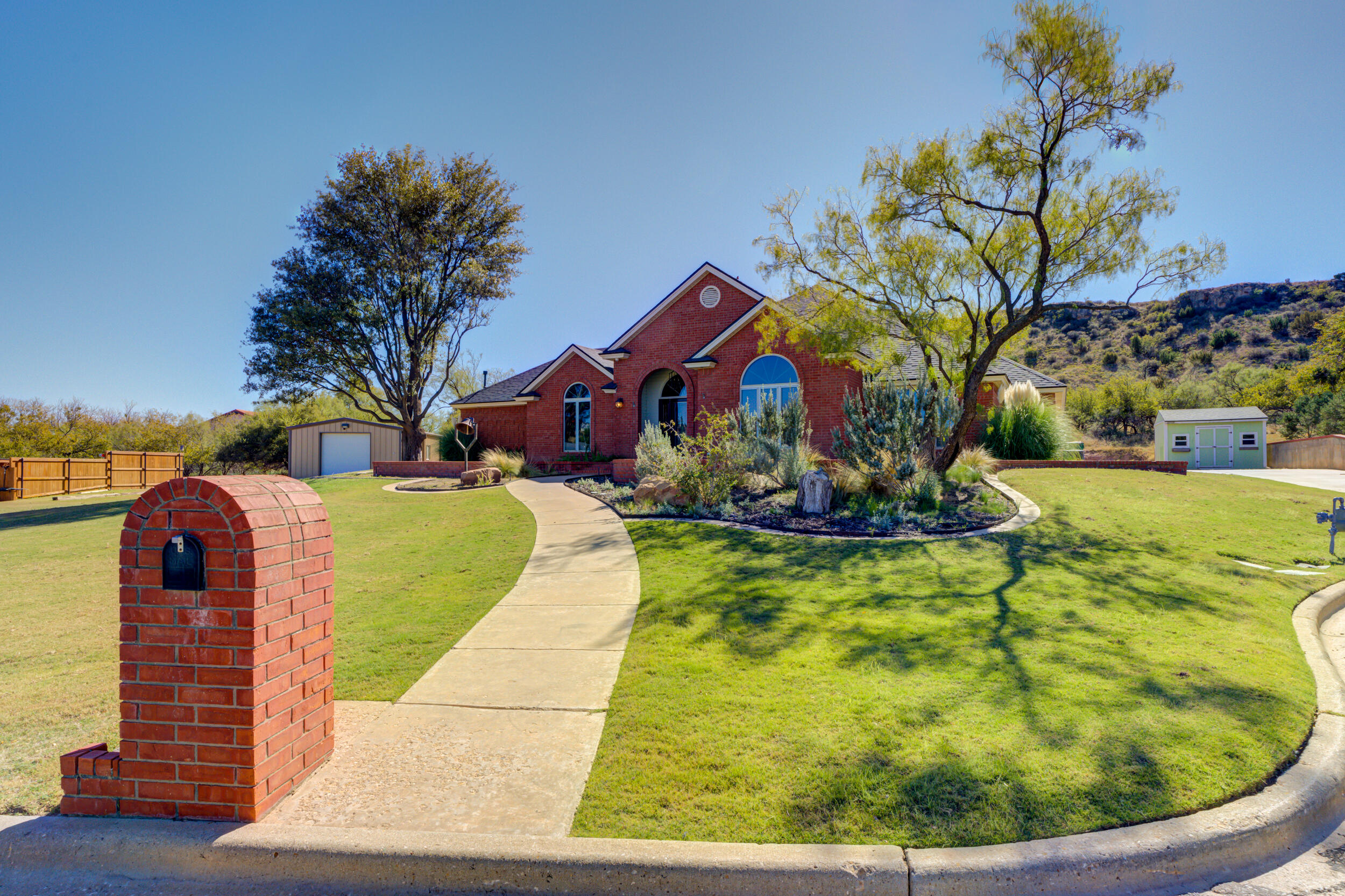 1 Squaw Lane Ransom Canyon, TX 79366 - Photo 2 of 74 a view of swimming pool with a yard