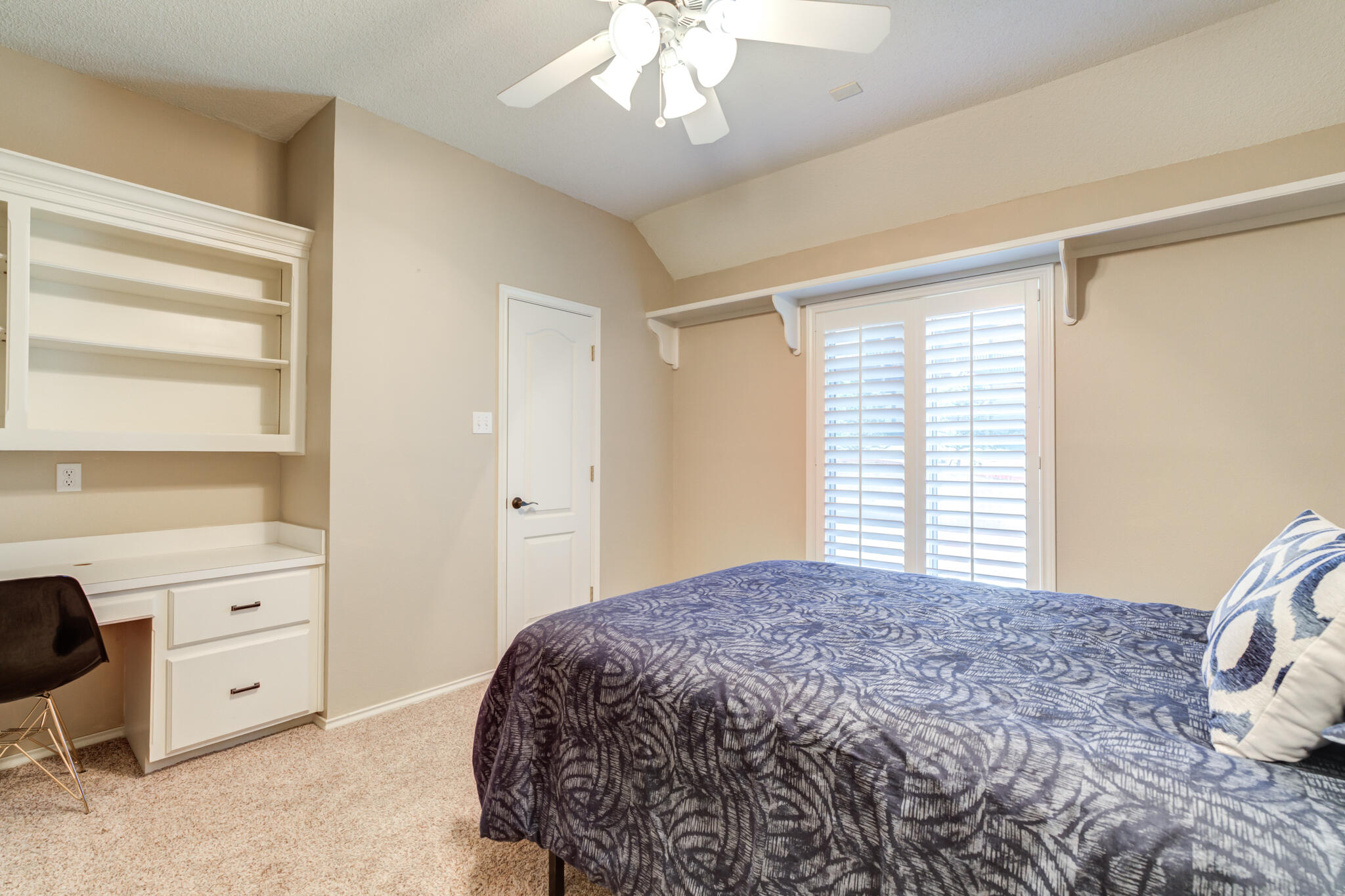 1 Squaw Lane Ransom Canyon, TX 79366 - Photo 45 of 74 a bedroom with a bed and a window
