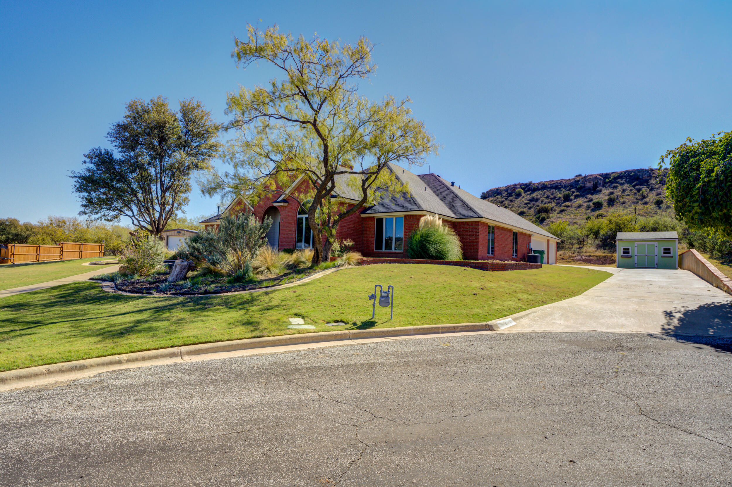 1 Squaw Lane Ransom Canyon, TX 79366 - Photo 5 of 74 a view of a house with a big yard