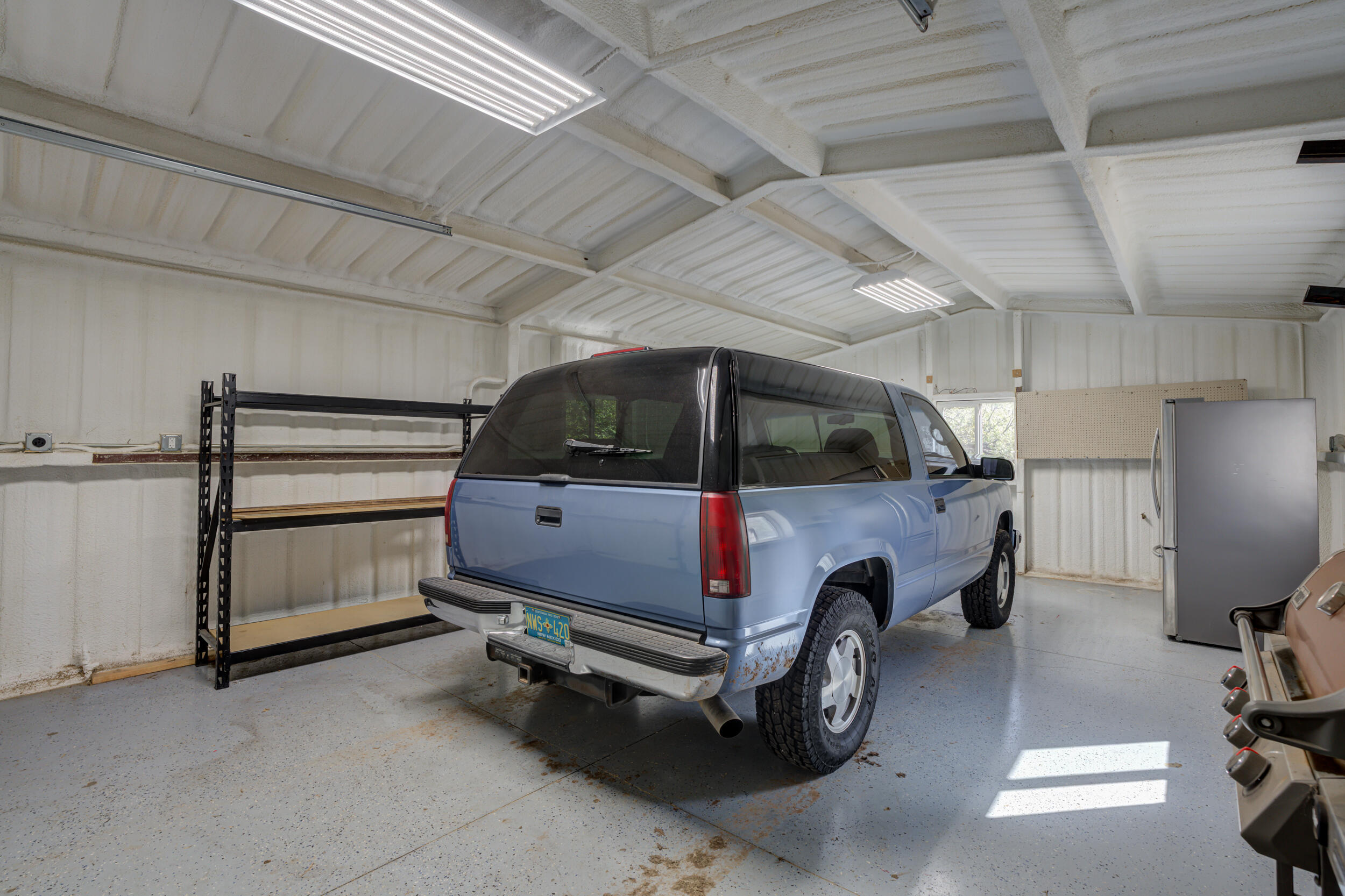 1 Squaw Lane Ransom Canyon, TX 79366 - Photo 60 of 74 a car that is parked in a garage