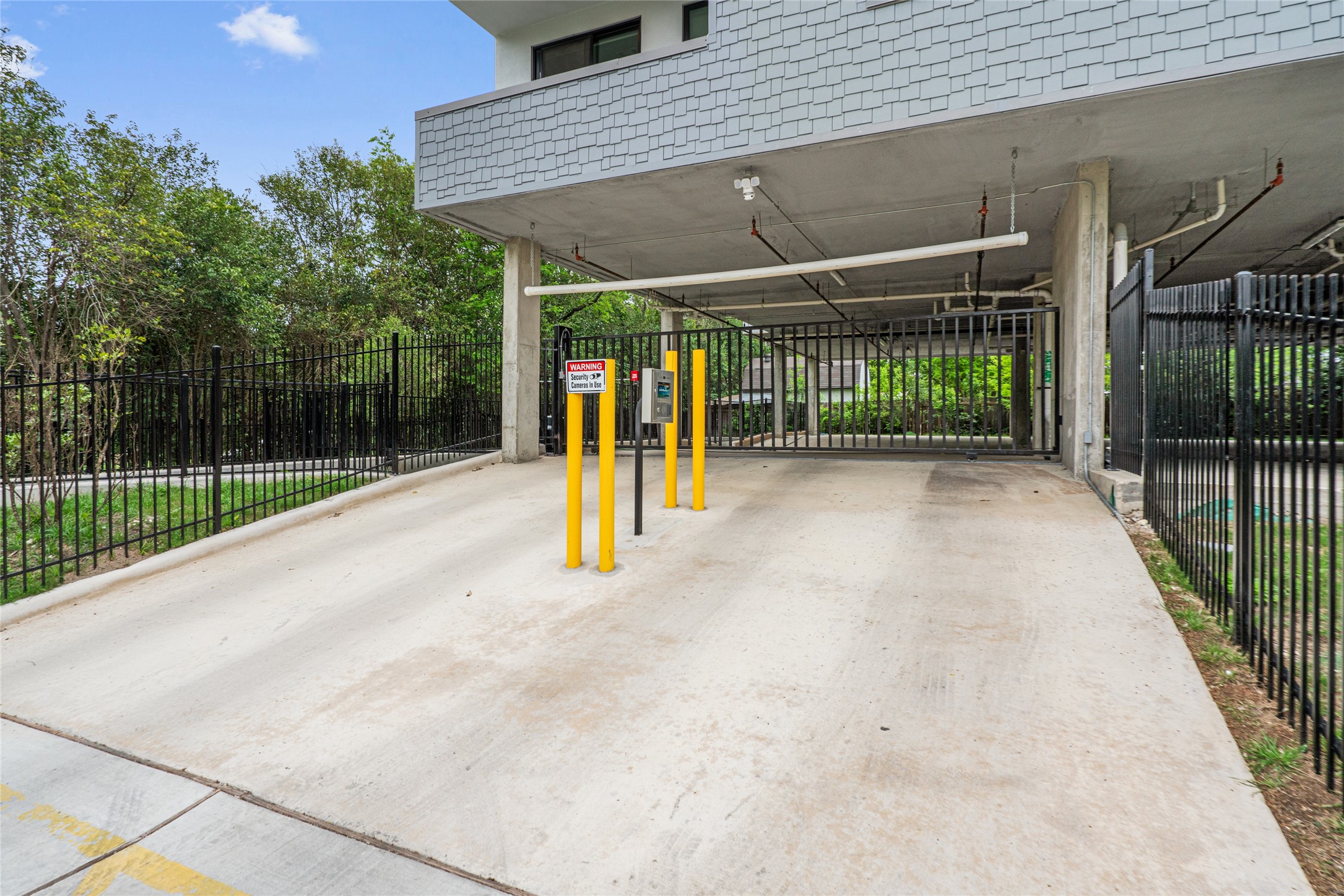 5515 Humming Bird Lane, Unit 306 Austin, TX 78745 - Photo 13 of 29 Secure entrance with App and FOB based access and video cameras all along the exterior of the community