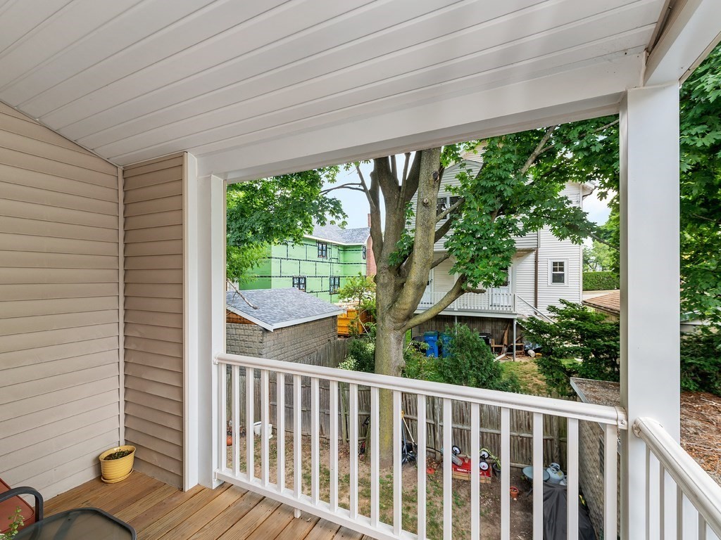 34 Watson Road, Unit 34 Belmont, MA 02478 - Photo 25 of 26 a view of a balcony with wooden floor