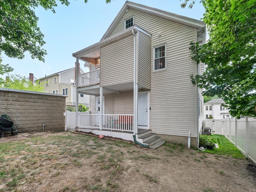 34 Watson Road, Unit 34 Belmont, MA 02478 - Photo 26 of 26 a view of a house with a backyard