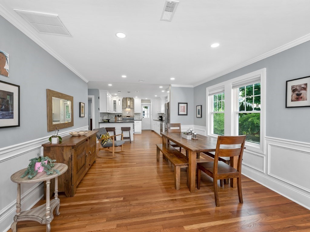 34 Watson Road, Unit 34 Belmont, MA 02478 - Photo 7 of 26 a view of a dining room with furniture and wooden floor