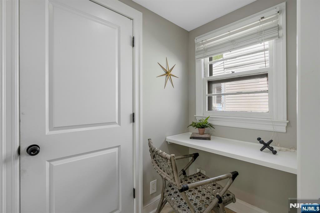20 West Saddle River Road Waldwick, NJ 07463 - Photo 18 of 39 a room that has a bed and a table in it