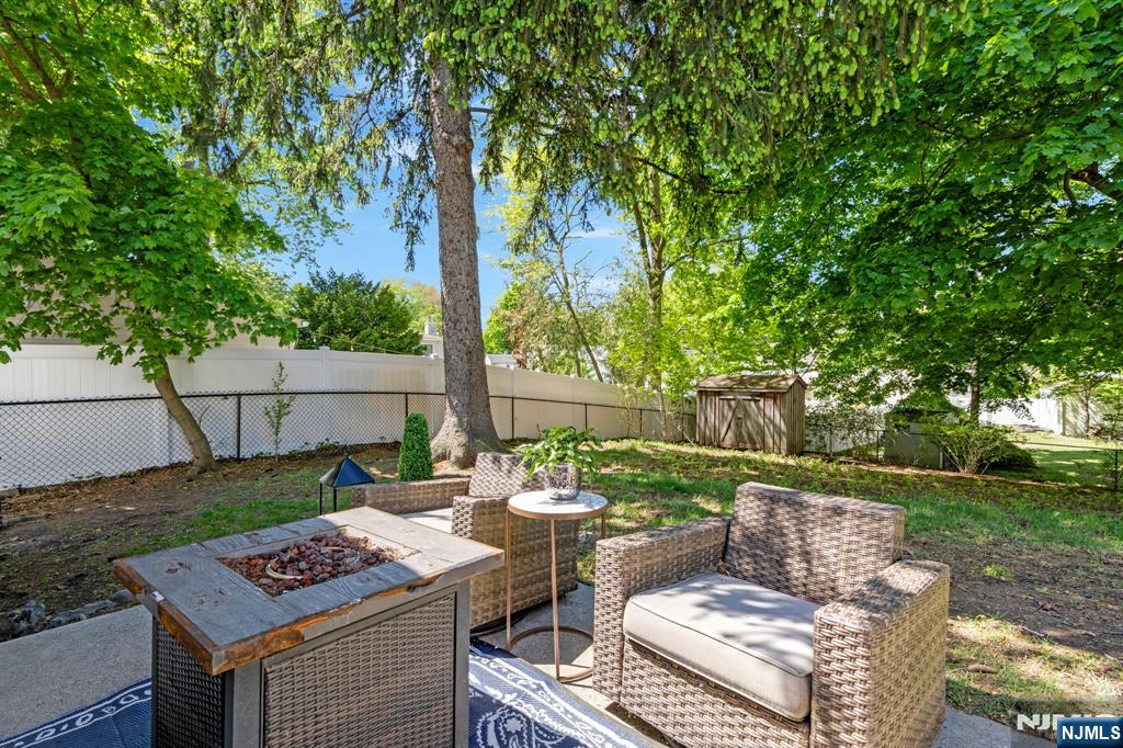 20 West Saddle River Road Waldwick, NJ 07463 - Photo 35 of 39 a view of a backyard with sitting area