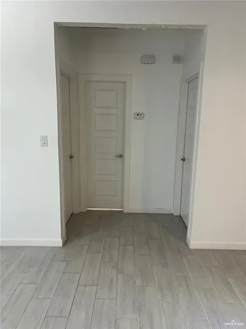 an empty room with a bench