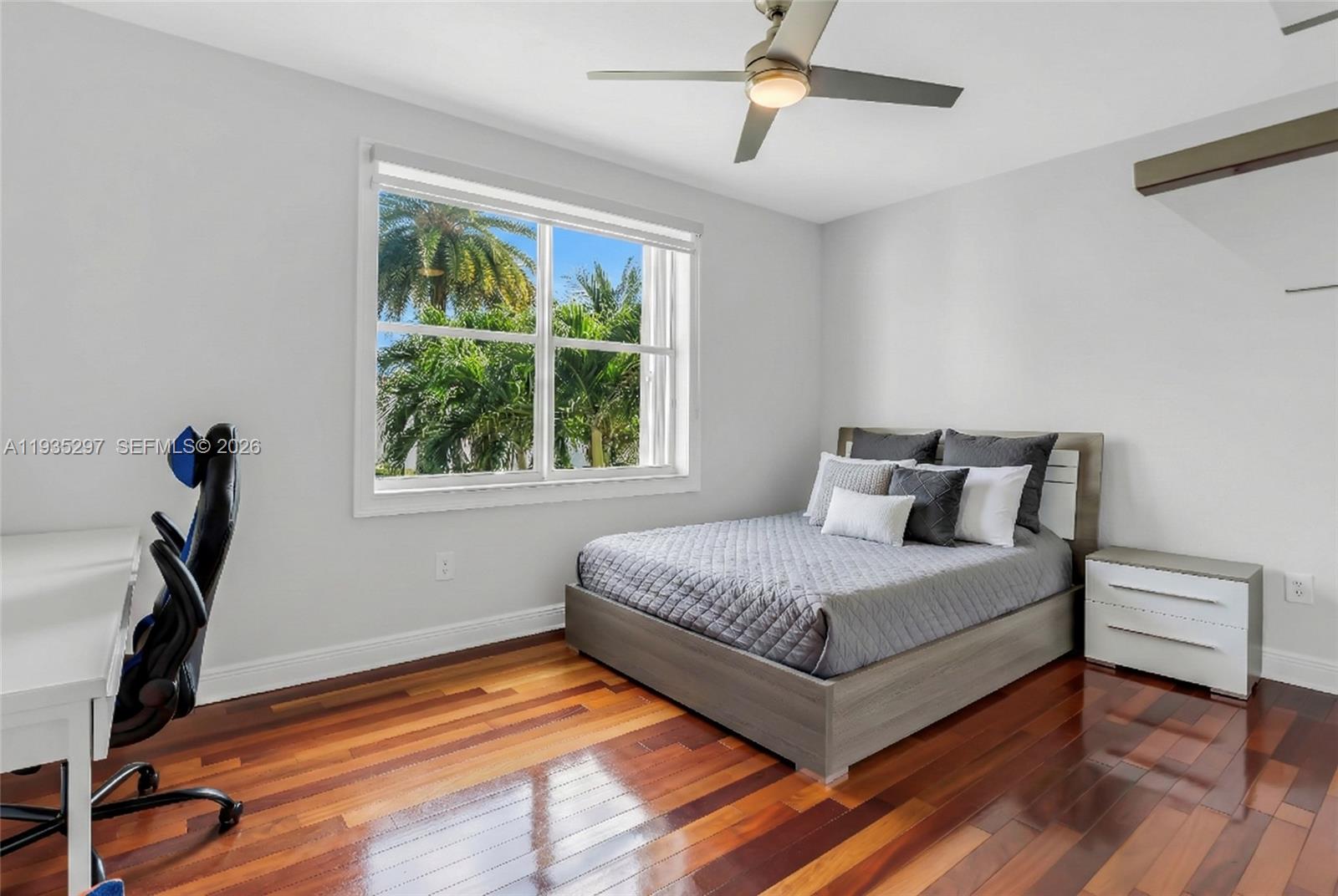 5311 Southwest 184th Way Miramar, FL 33029 - Photo 35 of 81 a bedroom with a bed and a window