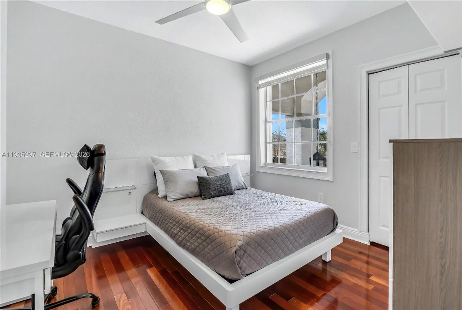 5311 Southwest 184th Way Miramar, FL 33029 - Photo 39 of 81 a bedroom with a bed and a window