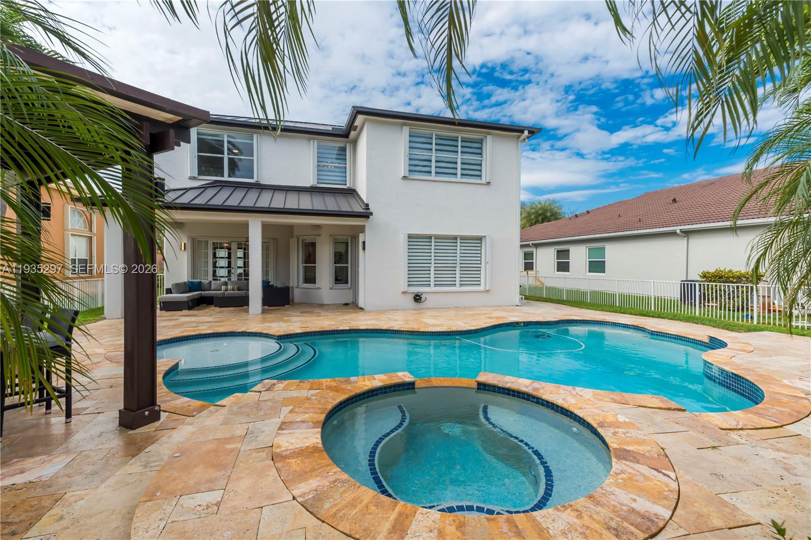 5311 Southwest 184th Way Miramar, FL 33029 - Photo 45 of 81 a view of a house with swimming pool