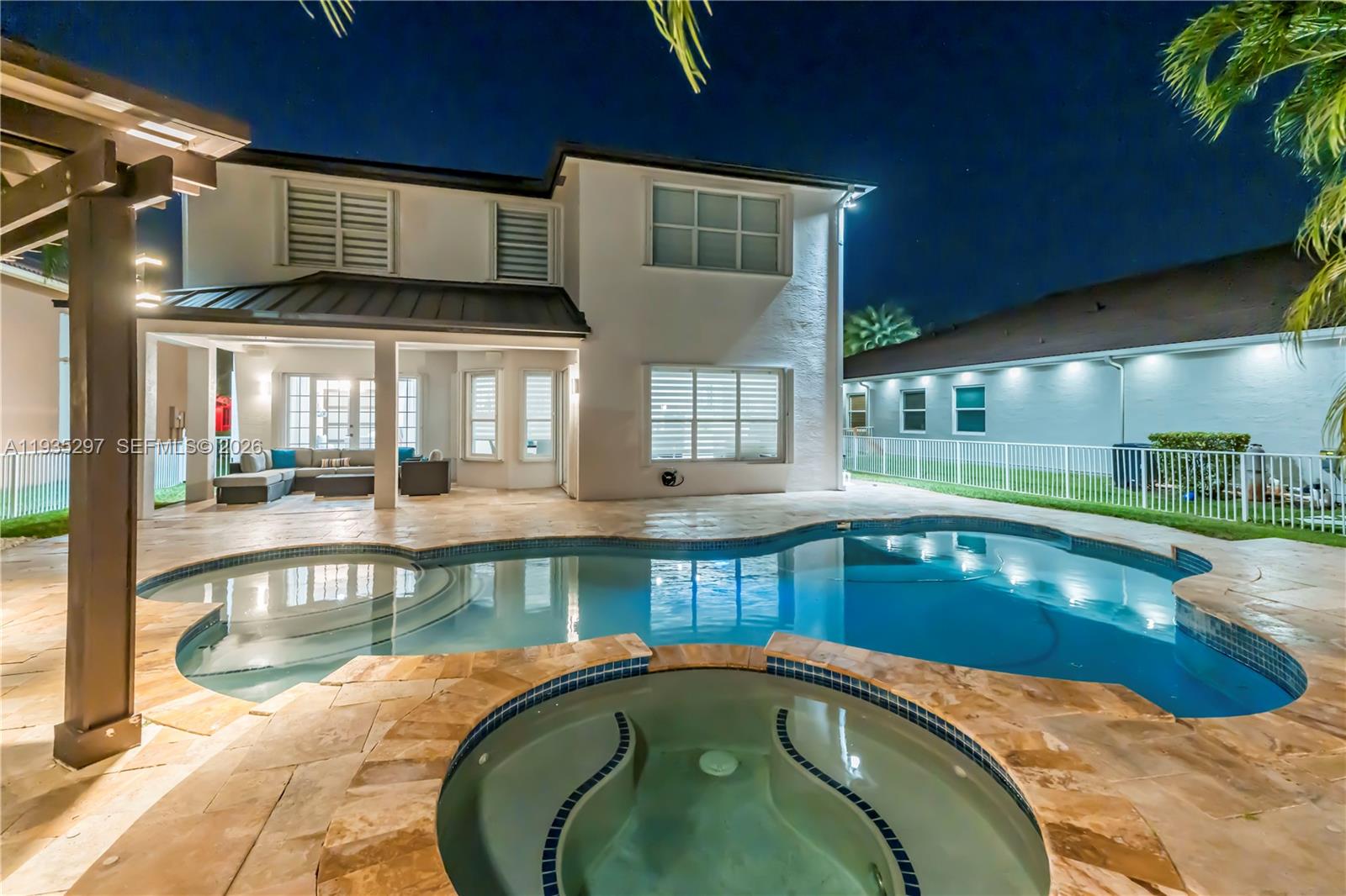 5311 Southwest 184th Way Miramar, FL 33029 - Photo 49 of 81 a view of a swimming pool with a outdoor seating