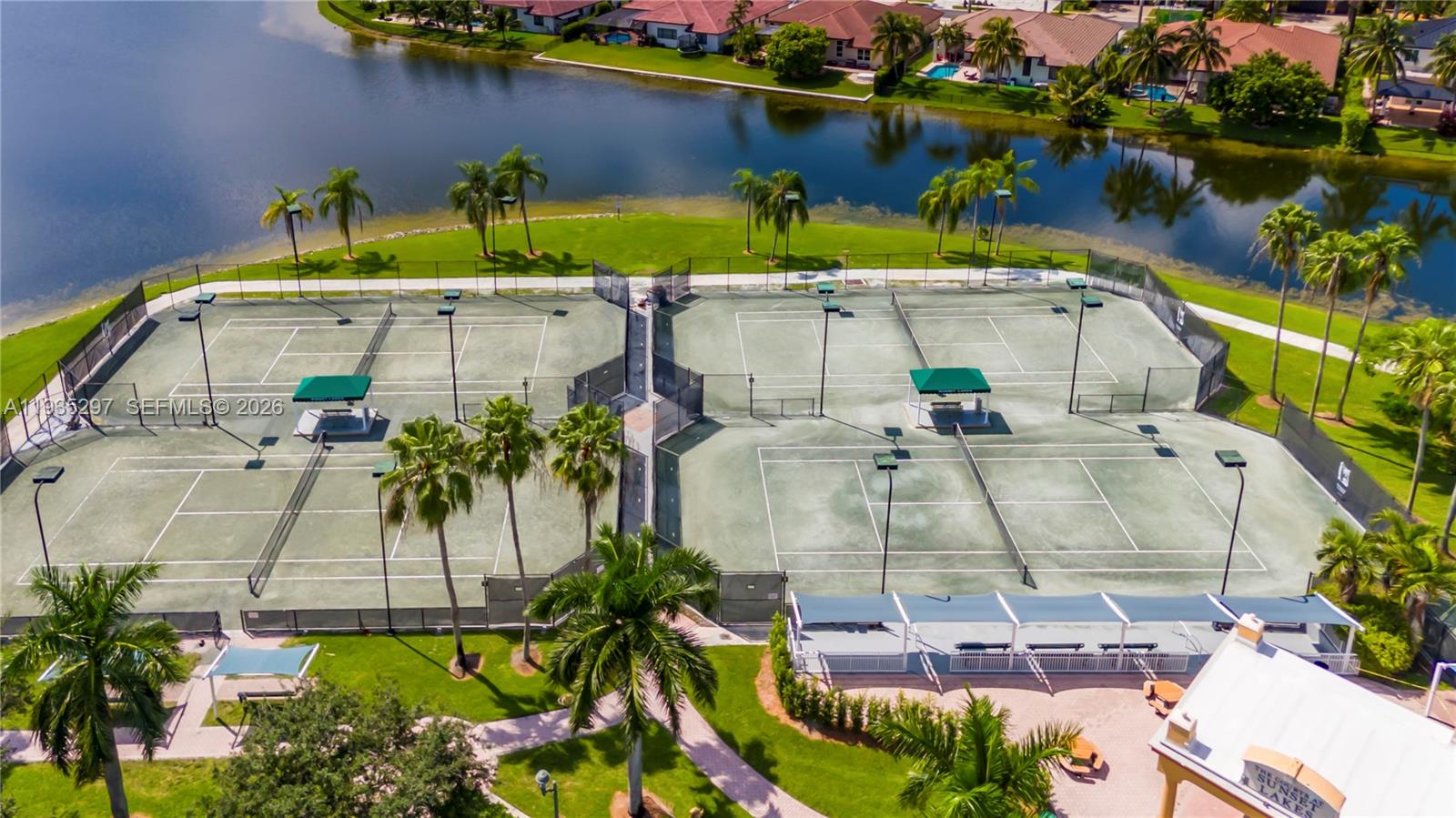 5311 Southwest 184th Way Miramar, FL 33029 - Photo 74 of 81 an aerial view of a house with a yard and a fountain
