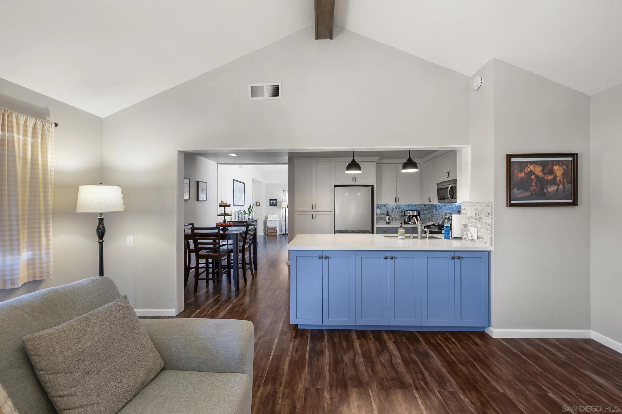 4652 Briar Ridge Road Oceanside, CA 92056 - Photo 11 of 34 a living room with furniture and a wooden floor