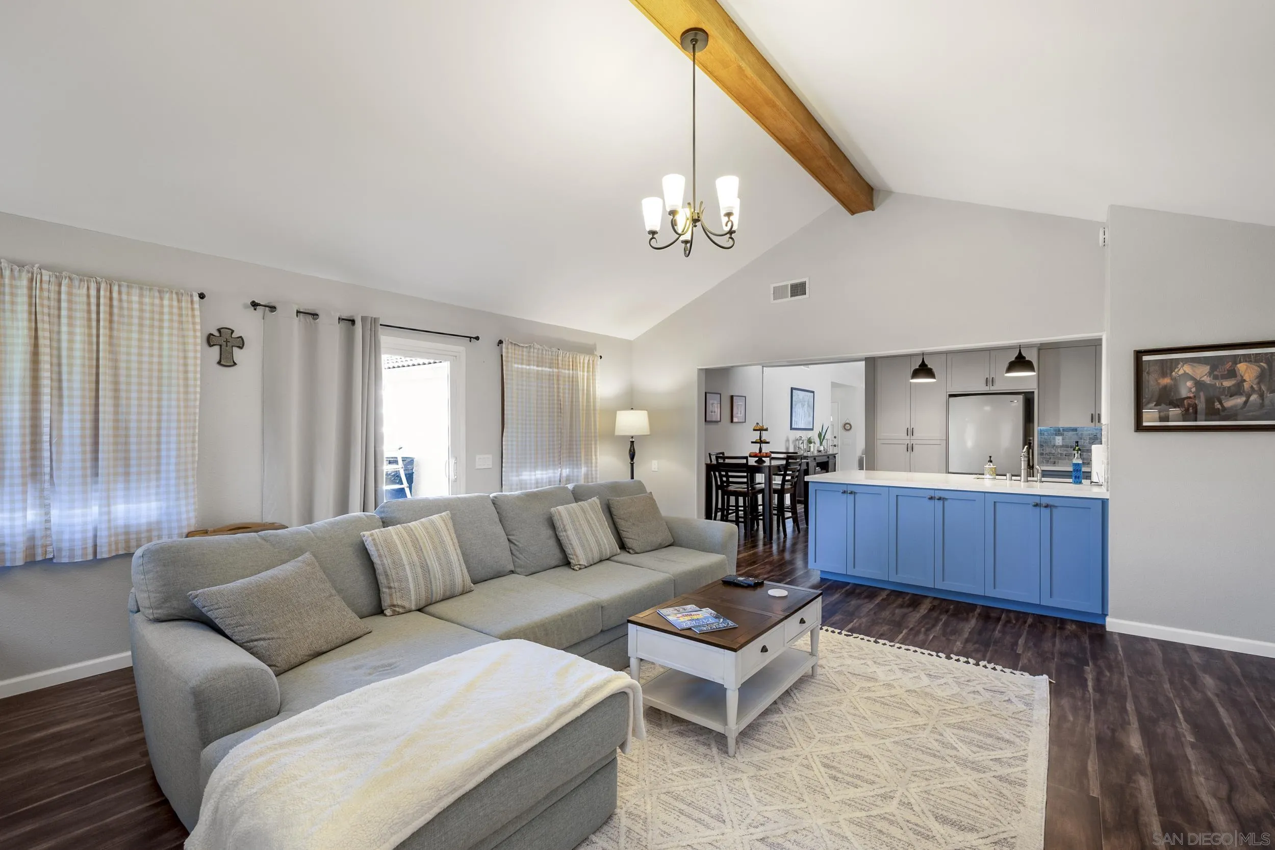 4652 Briar Ridge Road Oceanside, CA 92056 - Photo 12 of 34 a living room with furniture a couch and kitchen view