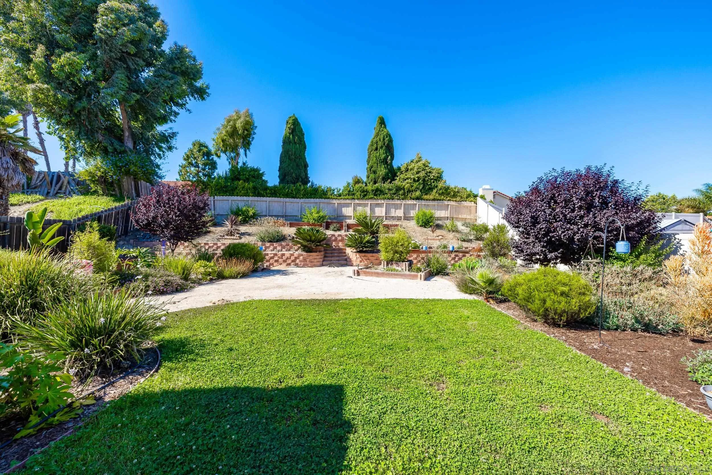 4652 Briar Ridge Road Oceanside, CA 92056 - Photo 25 of 34 a view of a swimming pool and outdoor space
