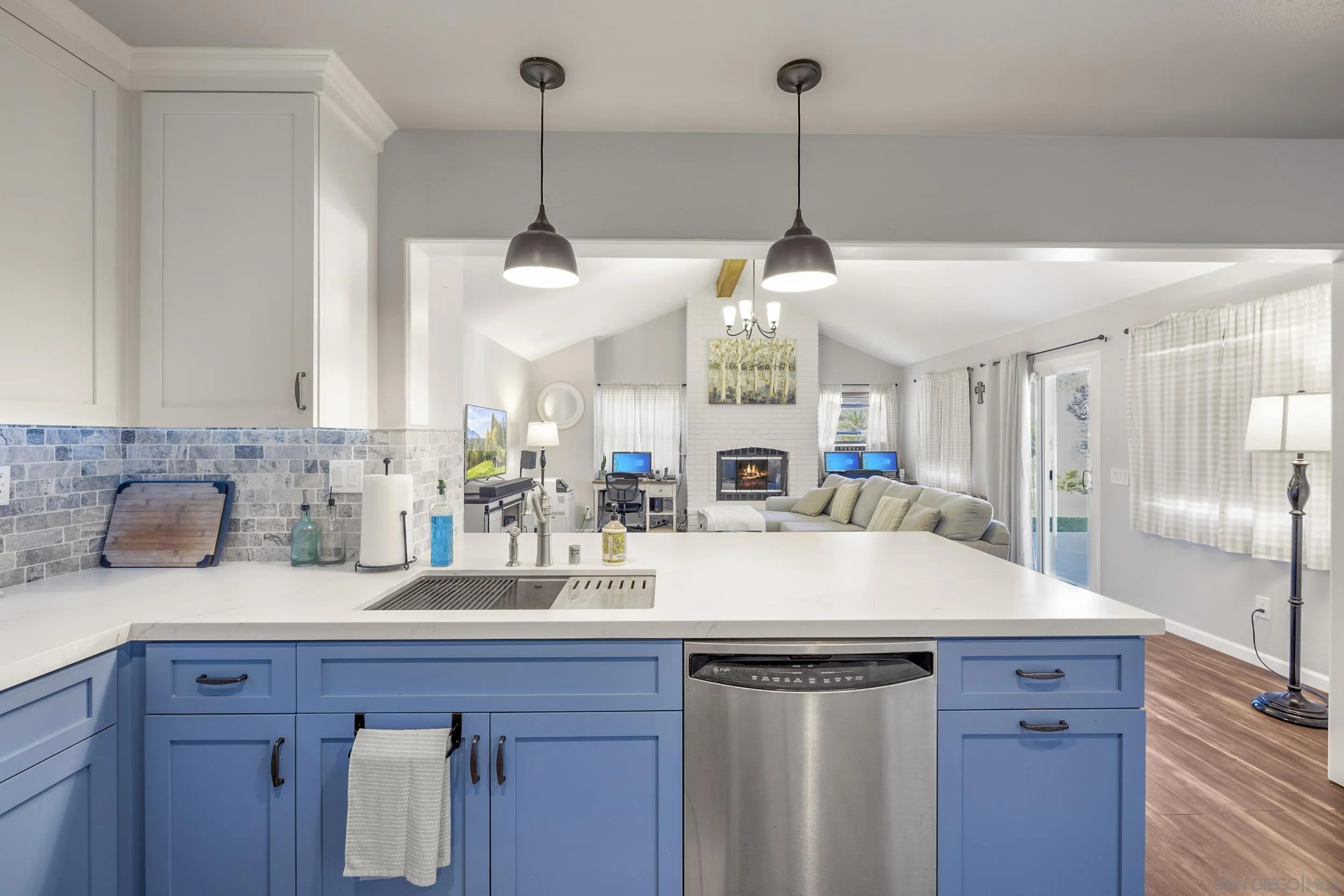 4652 Briar Ridge Road Oceanside, CA 92056 - Photo 8 of 34 a kitchen with sink and refrigerator