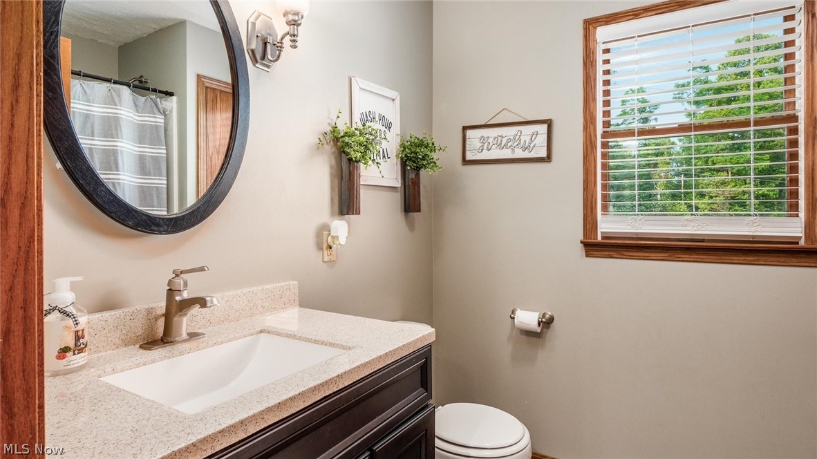 9393 Pioneer Road Byesville, OH 43723 - Photo 16 of 35 Bathroom featuring vanity and toilet