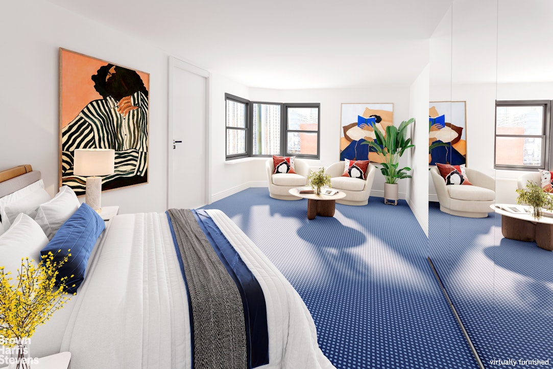 530 East 72nd Street, Unit 19E Manhattan, NY 10021 - Photo 6 of 15 a bed room with a bed and a couch