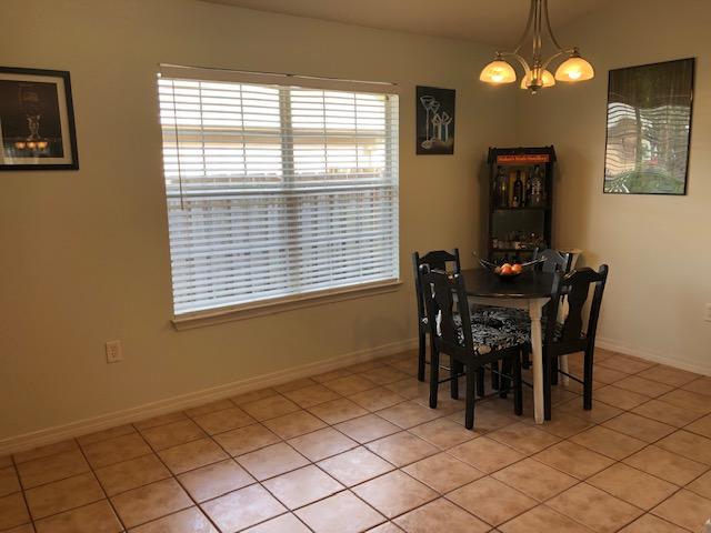 78 South Harborview Road Santa Rosa Beach, FL 32459 - Photo 4 of 32 a dining room with furniture and window