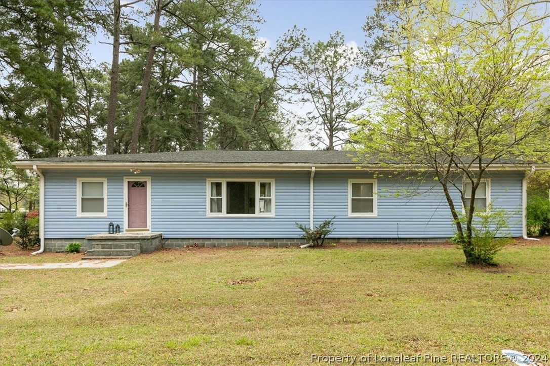 650 McKay Drive Spring Lake, NC 28390 - Photo 3 of 37 a house view with a outdoor space