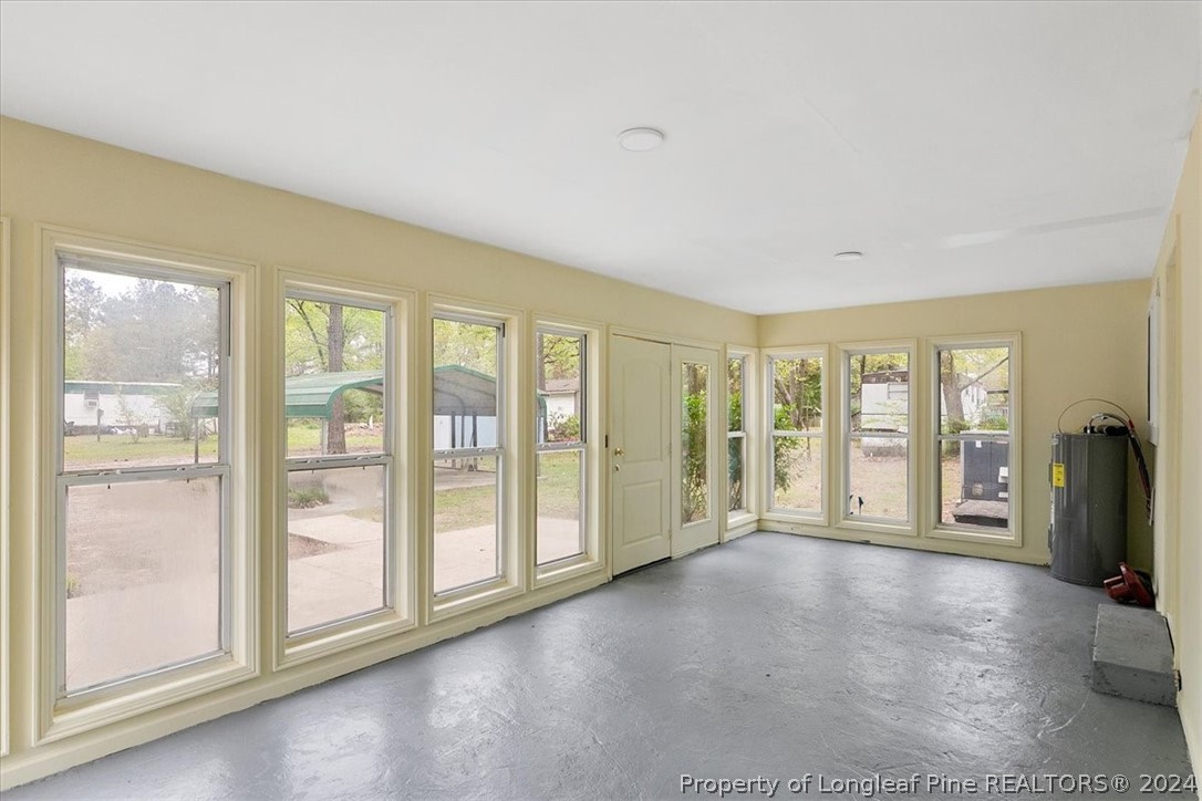 650 McKay Drive Spring Lake, NC 28390 - Photo 32 of 37 a view of an empty room with large windows