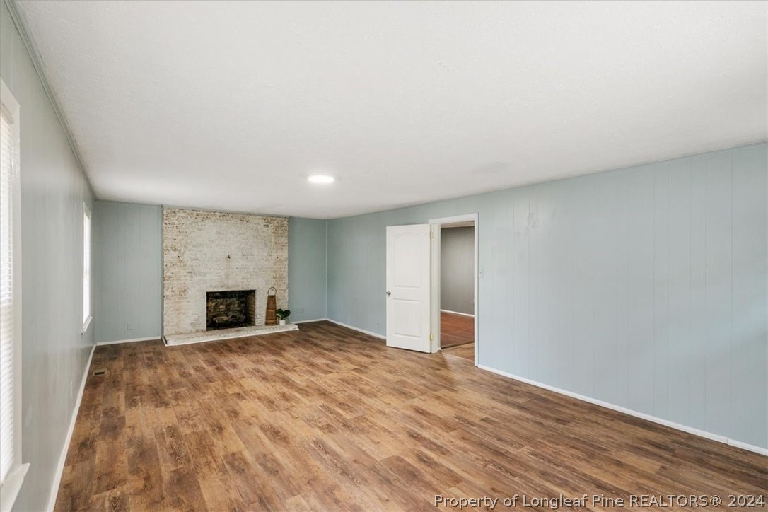 650 McKay Drive Spring Lake, NC 28390 - Photo 7 of 37 a view of empty room with wooden floor