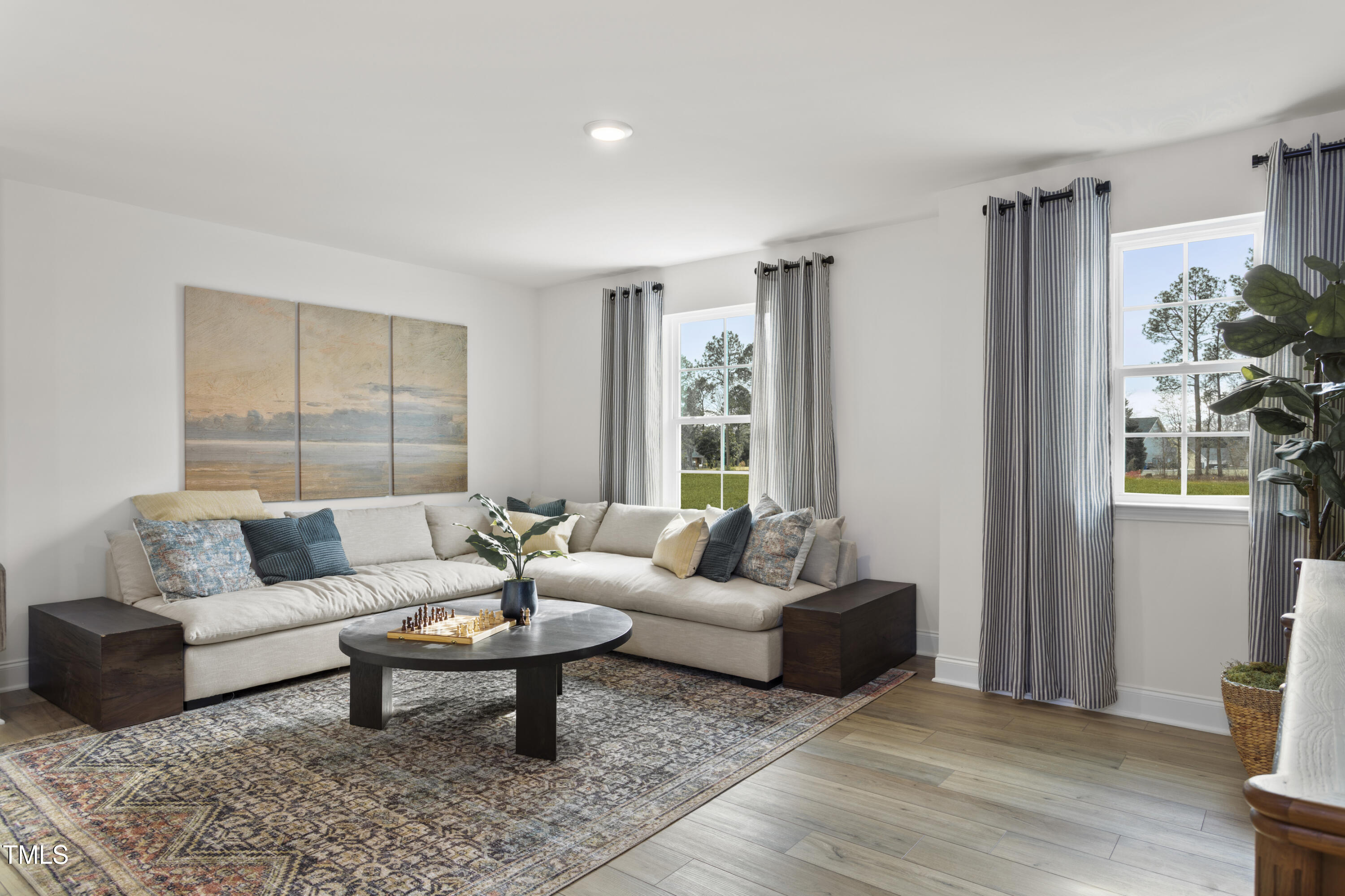 315 Adams Pointe Court Angier, NC 27501 - Photo 12 of 25 a living room with furniture and a large window