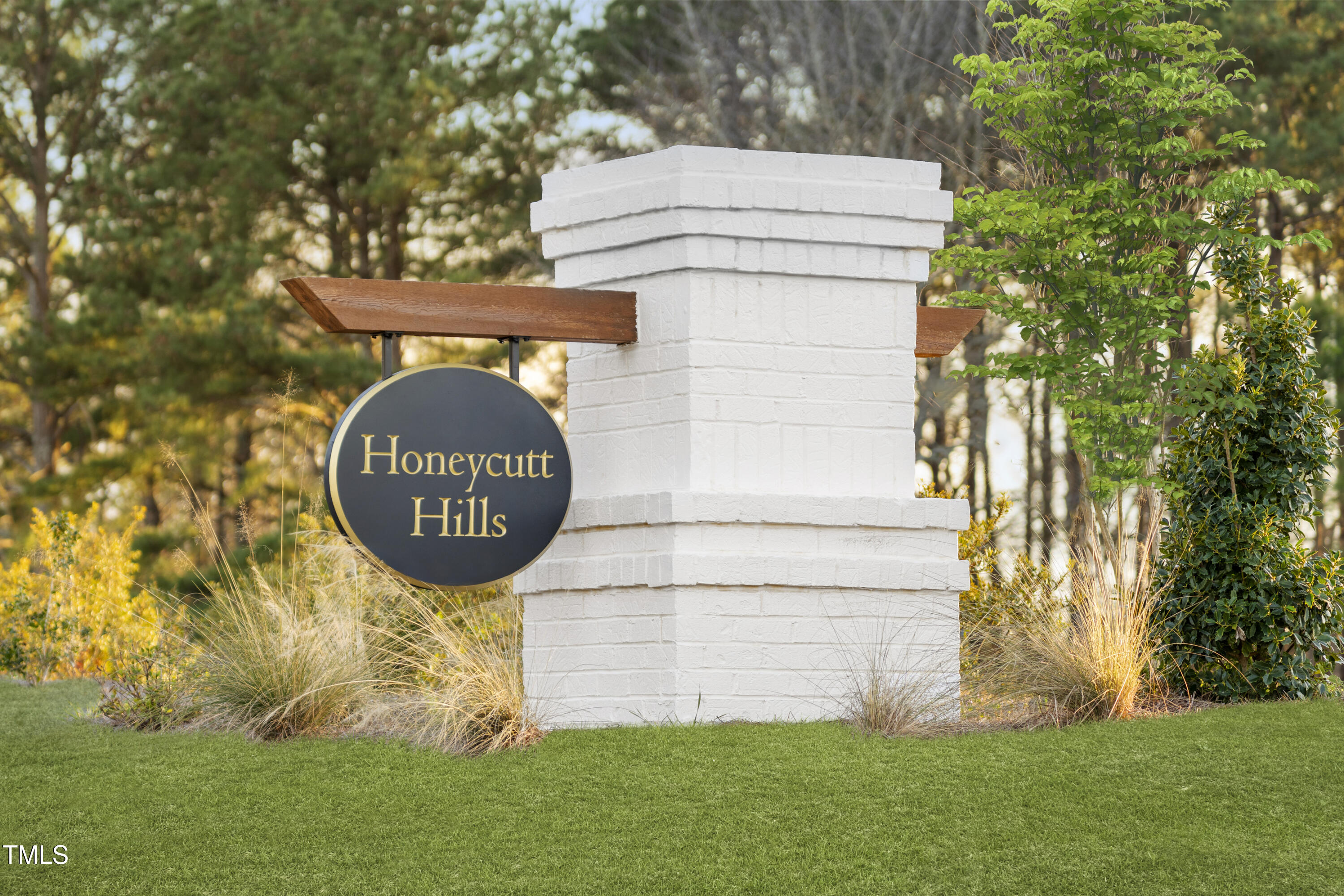 315 Adams Pointe Court Angier, NC 27501 - Photo 25 of 25 a view of outdoor space with sign board and garden