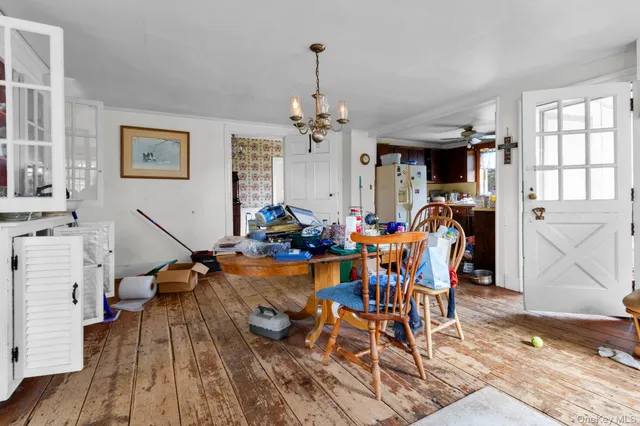 a kitchen with stainless steel appliances a stove a sink and a refrigerator