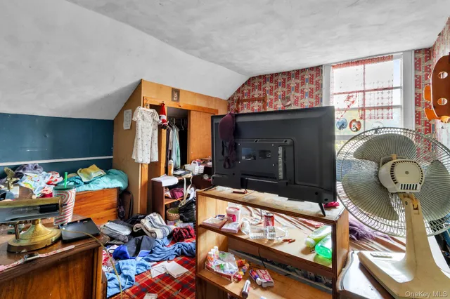 a view of grassy field with benches