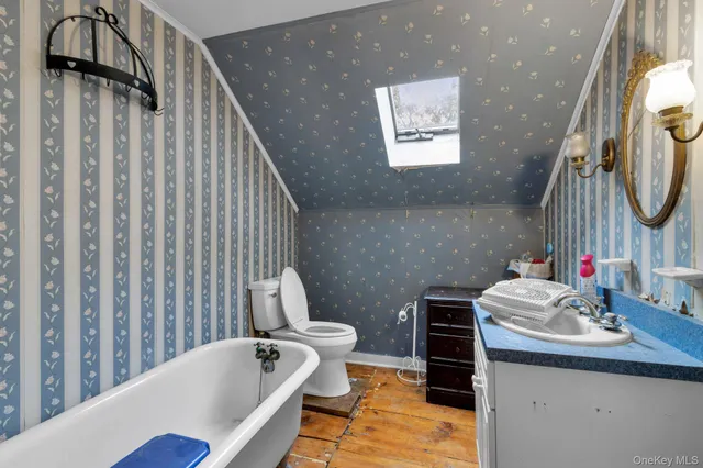 a view of a park with large trees