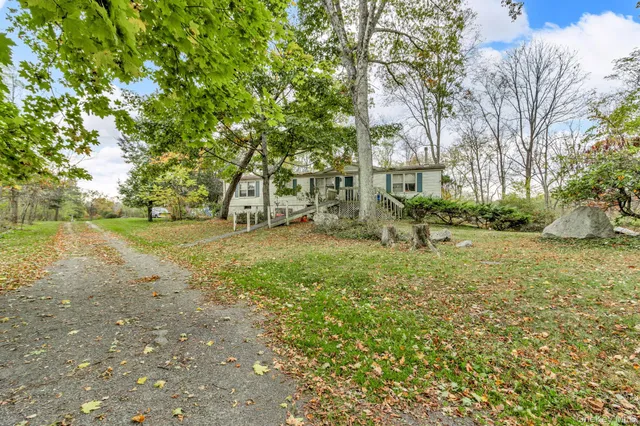 a kitchen with lots of counter top space and appliances