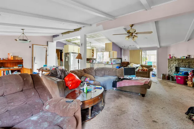 a room with furniture toys and a window