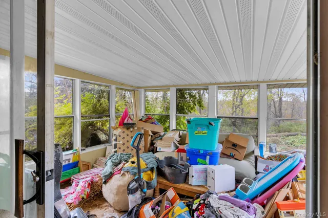 a room with furniture toys and a window