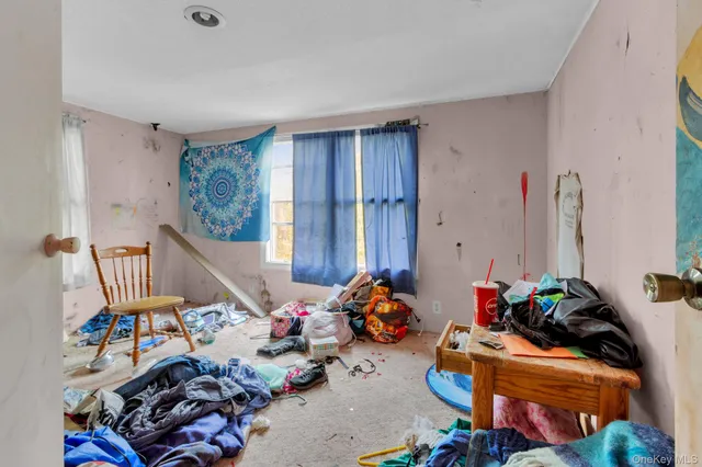 a green field with lots of trees