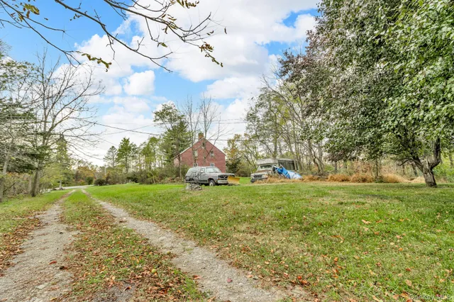 a fire hydrant in the middle of a field