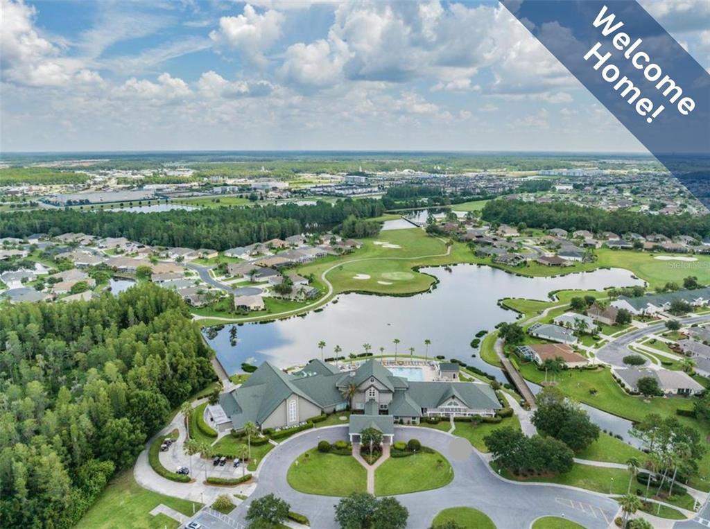 1751 Lakestone Drive Trinity, FL 34655 - Photo 26 of 51 an aerial view of a house with yard swimming pool and outdoor seating
