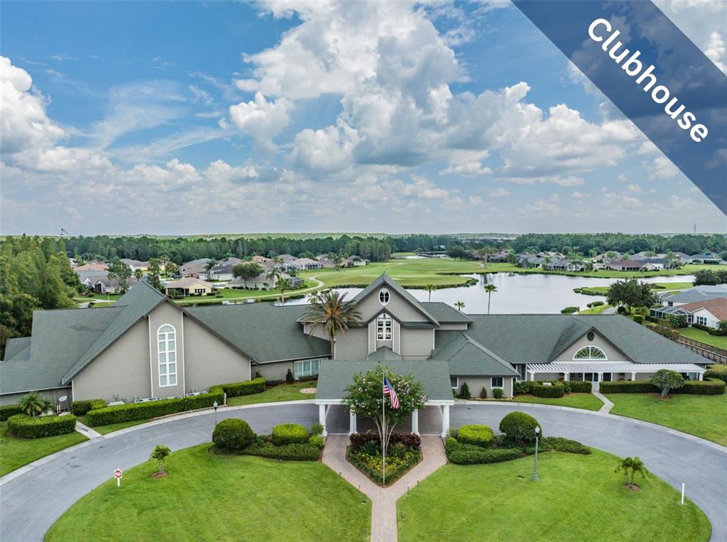 1751 Lakestone Drive Trinity, FL 34655 - Photo 27 of 51 an aerial view of a house with swimming pool and mountains