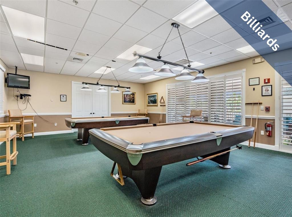 1751 Lakestone Drive Trinity, FL 34655 - Photo 37 of 51 a room with pool tables and windows