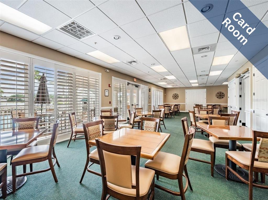 1751 Lakestone Drive Trinity, FL 34655 - Photo 39 of 51 a view of a dining room with furniture window and outside view