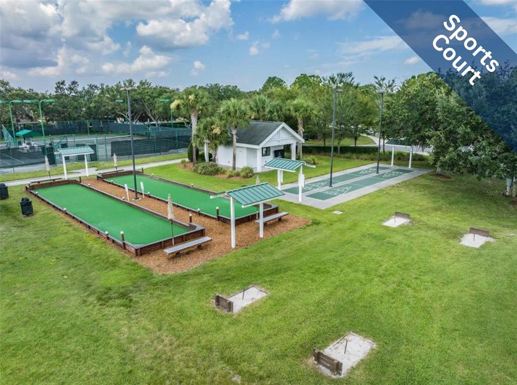 1751 Lakestone Drive Trinity, FL 34655 - Photo 49 of 51 a view of a house with a backyard porch and sitting area