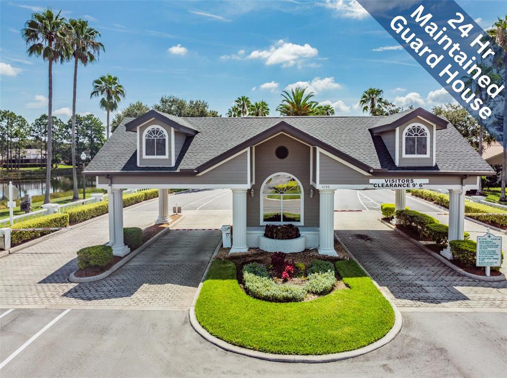 1751 Lakestone Drive Trinity, FL 34655 - Photo 50 of 51 a view of a house with a swimming pool