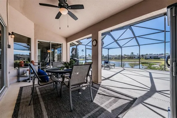 a view of a dining room with furniture window and outside view